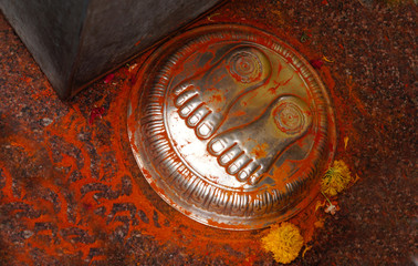 Closeup of Indian Hindu God feet,for people to offer prayers,in a temple