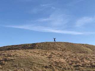 Boy on top of the mountain 