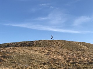 Jumping on top of the mountain 