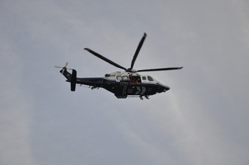 Fototapeta na wymiar Helicopter saving people