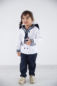 little kid profession uniform pretending to be sailor