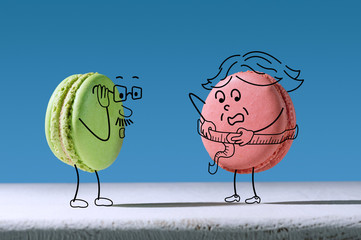 Funny macaron measures waist size. The concept of overweight. Hand-drawn colorful image of funny...