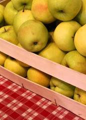 box with organic apples just picked