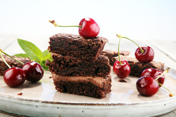 homemade chocolate brownies on rustic table. brownie bakery.