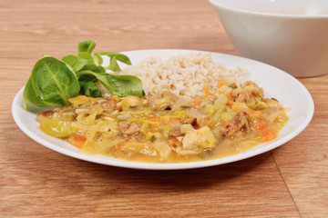 China of soy noodles and leek with rice on a white