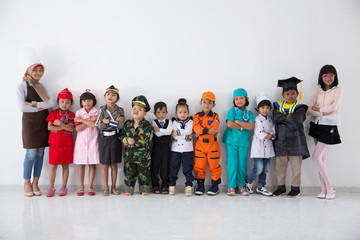 Naklejka premium kids with diverse multi profession uniform