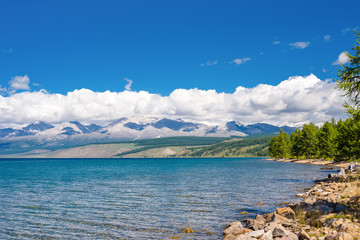  Wild nature of Mongolia. A beautiful view of Lake Hovsgol and the Eastern Sayan Ridge on a sunny summer day 