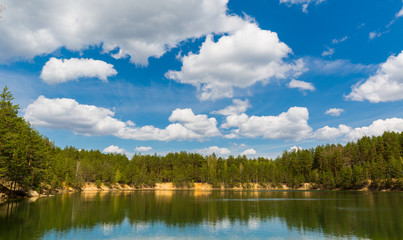 Fototapeta na wymiar lake in pine forest