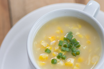 Corn soup in white bowl , healthy food - 207774676
