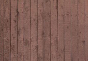 Fototapeta premium Brown wooden wall with vertical planks