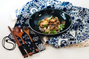 Vietnamese style caramel pork with rice and vegetable