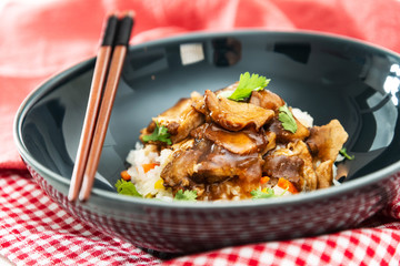 Vietnamese style caramel pork with rice and vegetable