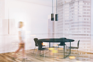 Black table dining room corner, woman