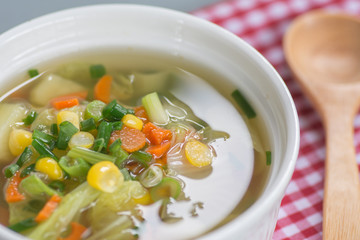 Vegetable soup in white bowl , healthy food