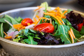 Fresh salad - Delicious fresh salad with tomatoes, lettuce, eggplant, zucchini, cheese, parma ham and olive oil.