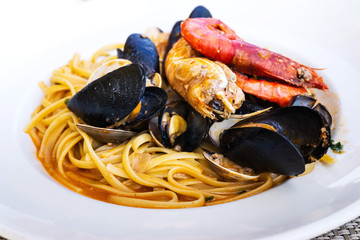 Pasta with seafood Dinner Dish on a the table