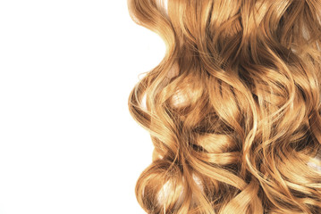 long blond wavy hair isolated on white background
