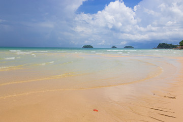 Sea view on bright blue beach from tropical. clouds on horizon and some storm clouds. Outdoor travel style. Koh Chang in THAILAND