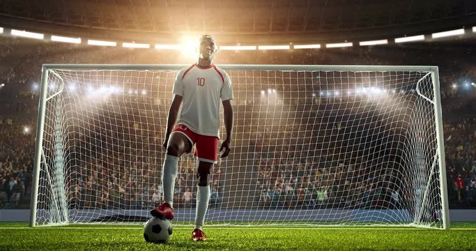 Soccer player show his skills on a professional soccer stadium. Stadium and crowd is made in 3D and animated
