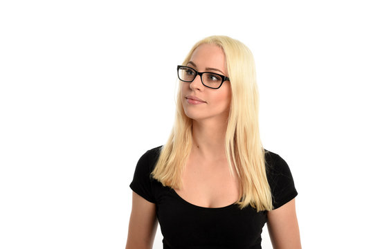 portrait of pretty blonde girl wearing glasses and black shirt. isolated on white background.