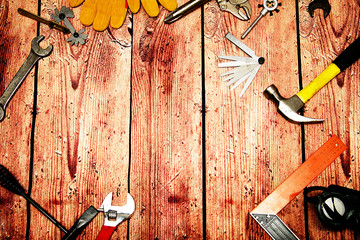 Top view close up of variety handy tools on wood background with copy space for your text for Worker's day, labour's day background