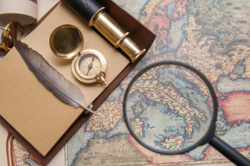 Quill pen, notebook, old papers and vintage items