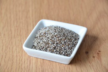 Fototapeta na wymiar Healthy chia seeds on white. Raw food. Organic food.