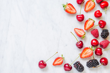 Fresh fruits copy space on marble table top view.