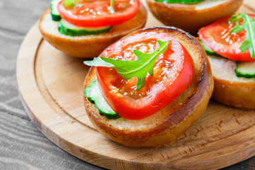 Dietary sandwiches with cucumbers, tomatoes and arugula
