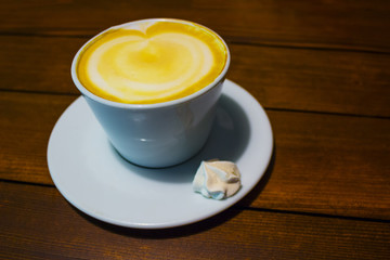 Cup of coffee with meringue