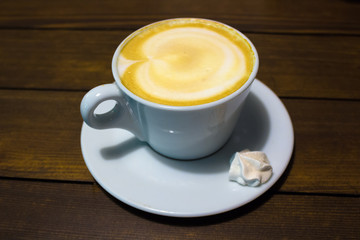 Cup of coffee with meringue