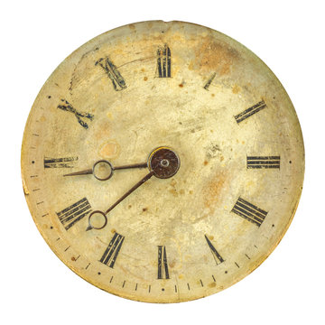 Ancient weathered clock face with faded numbers