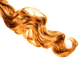long curly strawberry blond hair isolated on white background