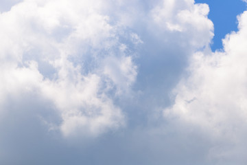 Big white clouds in the summer sky.