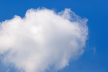 Big white clouds in the summer sky.