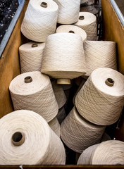 Traditional wool reels of the british waving and textile industry