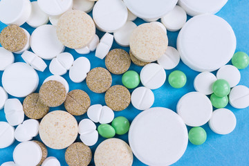 pills on a blue background