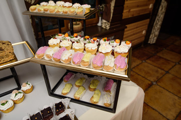 Delicious fancy wedding cake made of cupcakes