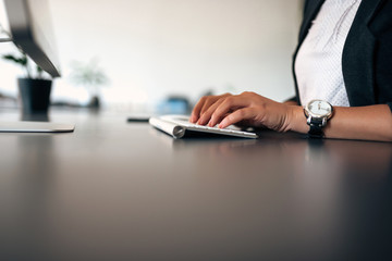 Close-up image of female office worker. Copy space.