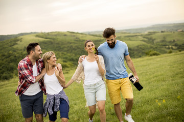 Group od young people having fun on a trip in nature