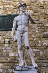Obraz premium Reproduction of Michelangelo statue David in front of Palazzo Vecchio in Florence