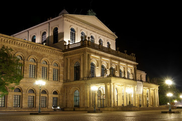 Fototapeta na wymiar Hannover Opera House illuminated at night in Hanover, Germany