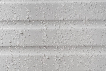 water drops on ceramic tile in bathroom