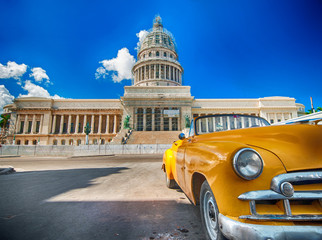 view of the capitol in the havana and classic cart
