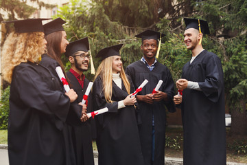 Group of multiethnic students on graduation day