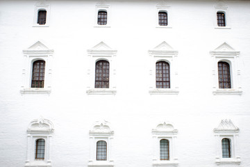 Fototapeta na wymiar Old Windows on ancient building