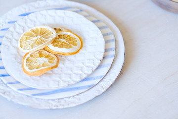 handmade crockery background. craft clay plates with painted design