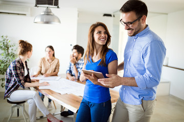 Obraz premium Creative coworkers working in office