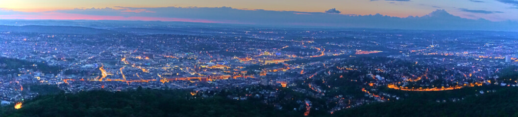 Fototapeta premium Sunset over Stuttgart City in Germany / View from the first TV Tower in the world