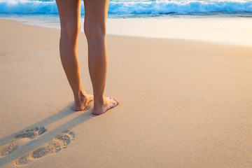 Travel woman foot on beach